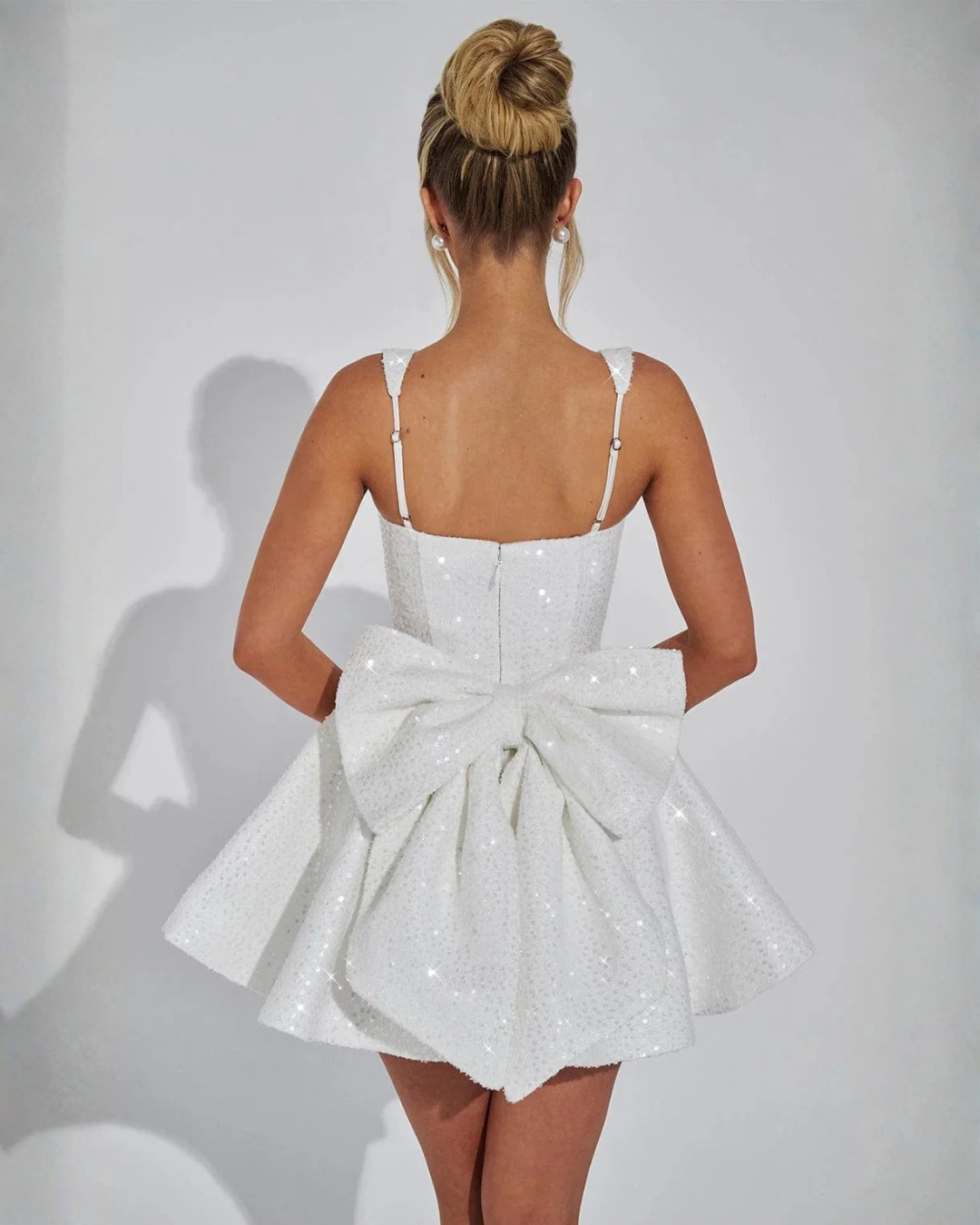 Victoria™ Dazzling Sequin Bow Mini Dress